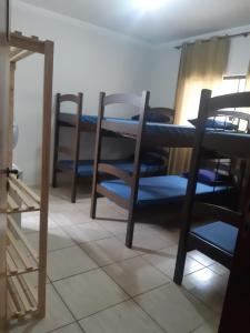 Postel nebo postele na pokoji v ubytování Cascais Quartos & Suítes