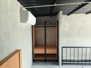 En eller flere senge i et værelse på Nia room 2