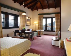 Postel nebo postele na pokoji v ubytování HOTEL SPA MONTANA