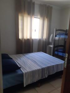Postel nebo postele na pokoji v ubytování Cascais Quartos & Suítes