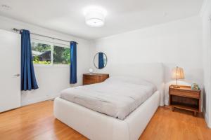 Voodi või voodid majutusasutuse Spacious Mountain View Duplex in Prime Location Duplex toas