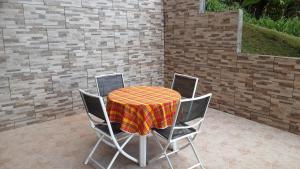 Φωτογραφία από το άλμπουμ του VILLA CHARLY Spacieux bas de Villa, vue sur mer σε Sainte-Rose +6 φωτογραφίες