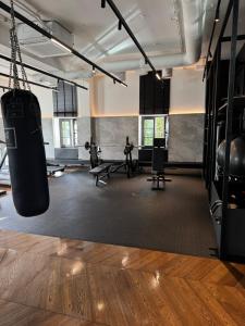 a gym with a punching bag hanging from the ceiling at Modern Vero Apartments Portova in Gdynia