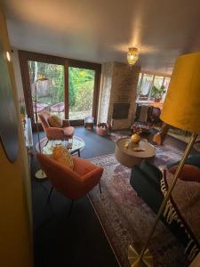 Posezení v ubytování Bungalow AMNIS by Sonnevijver Residences