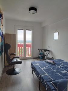 Postel nebo postele na pokoji v ubytování Les CHAMBRES de PERPIGNAN + 5 fotografií