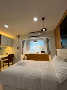 Ένα ή περισσότερα κρεβάτια σε δωμάτιο στο Prontera room 312