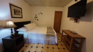 Postelja oz. postelje v sobi nastanitve Hotel Dos Rios