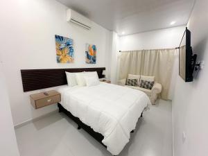 Voodi või voodid majutusasutuse Helechos Hotel toas