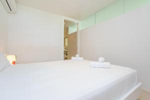 Ένα ή περισσότερα κρεβάτια σε δωμάτιο στο Tarida