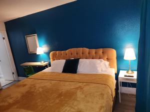 Ένα ή περισσότερα κρεβάτια σε δωμάτιο στο Beautiful 2-Bedroom Condo Near Universal and other Orlando Attractions, King Bed & Wi-Fi