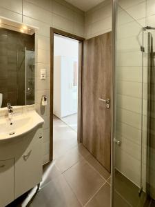 Koupelna v ubytování CENTER rooms