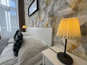 Postel nebo postele na pokoji v ubytování CENTER rooms