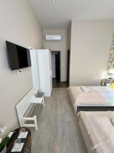 TV a/nebo společenská místnost v ubytování CENTER rooms