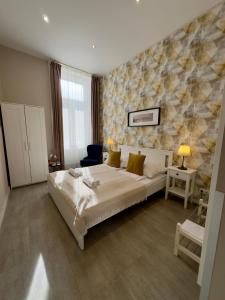 Postel nebo postele na pokoji v ubytování CENTER rooms