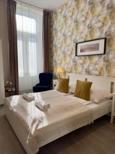 Postel nebo postele na pokoji v ubytování CENTER rooms