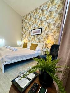 Postel nebo postele na pokoji v ubytování CENTER rooms