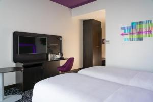 Кровать или кровати в номере Park Inn by Radisson, Nairobi Westlands