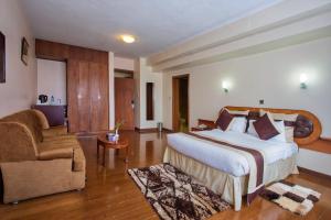 Postel nebo postele na pokoji v ubytování Sirikwa Hotel + 22 fotografií