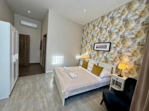 Postel nebo postele na pokoji v ubytování CENTER rooms
