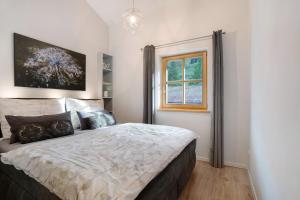 Ένα ή περισσότερα κρεβάτια σε δωμάτιο στο Ferienwohnung Unternberg +10 φωτογραφίες