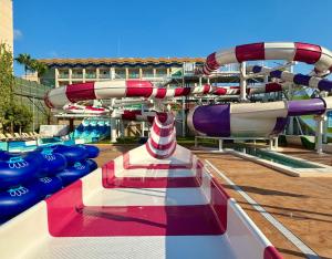Der Swimmingpool an oder in der Nähe von Hotel Magic Games 4