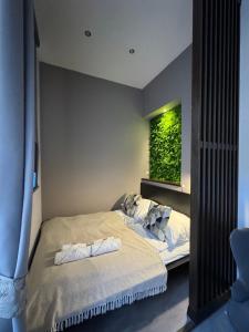 Postel nebo postele na pokoji v ubytování CENTER rooms