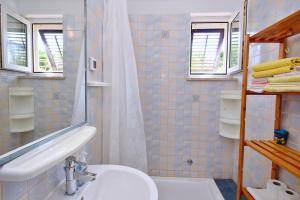 Koupelna v ubytování Apartment Bujas + 14 fotografií