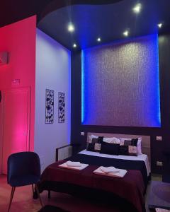 Letto o letti in una camera di Atanasia Suite