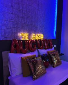 Letto o letti in una camera di Atanasia Suite