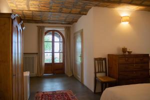 Postel nebo postele na pokoji v ubytování Agriturismo Sanventura