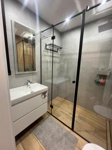 Ένα μπάνιο στο Laguna Beskidów Apartament A61 +23 φωτογραφίες