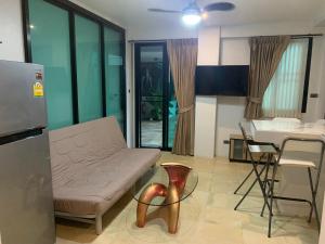 TV a/nebo společenská místnost v ubytování Penthouse Crystal Bay Apartments