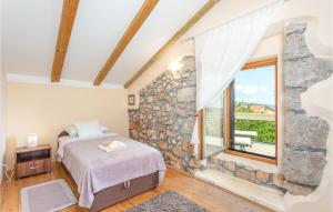 Ein Bett oder Betten in einem Zimmer der Unterkunft Villa Ala