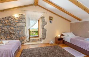 Ein Bett oder Betten in einem Zimmer der Unterkunft Villa Ala