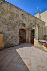 Fotografie z fotogalerie ubytování Farmhouse Razzett Ta' Twil v destinaci Għarb