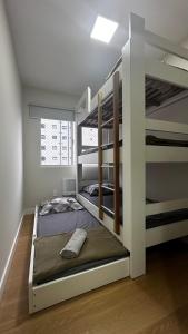 Katil atau katil-katil dalam bilik di PZ01- 3 Quartos| Pé na Areia| Vista Mar| Churrasq.
