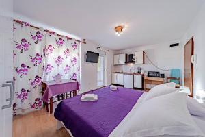 Posteľ alebo postele v izbe v ubytovaní Apartments Barcot