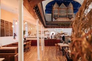 a restaurant with a building on the ceiling at Charming Cottage in the Heart of Frome with parking in Frome