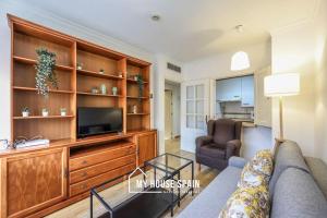 TV a/nebo společenská místnost v ubytování MyHouseSpain - Con parking junto a IFEMA y Barajas