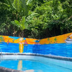 Bazén v ubytování Hostal Aventura Tayrona nebo v jeho okolí