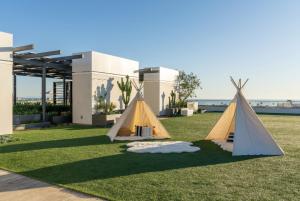 Κήπος έξω από το The Sapphire Nest - Spectacular Rooftop Amenities Ocean views 2BR