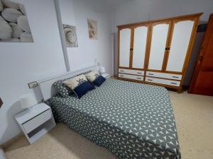 A bed or beds in a room at Casa La Palmera