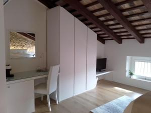 Televízia a/alebo spoločenská miestnosť v ubytovaní Affittacamere CASA DOLCE CASA SAN DANIELE