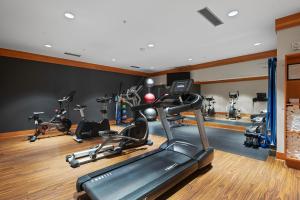 a gym with several exercise bikes in a room at Summertime Sanctuary Top-floor Mountain Studio in Snowmass Village +9 photos