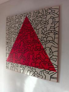 a painting of a red pyramid on a wall at Residenza Cornicello in Bardolino