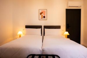 Postel nebo postele na pokoji v ubytování Hotel Gran Vía by gaiarooms