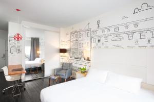 a bedroom with a bed and a drawing on the wall at NU Hotel in Brooklyn