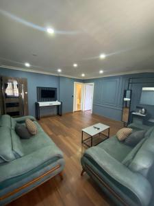 a living room with two couches and a table at Luu Hotel in Çorlu +18 photos