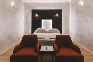 Posezení v ubytování DelleArti Design Hotel