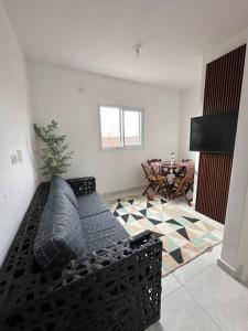 Χώρος καθιστικού στο 2 - Casa 5 pessoas - Praia Guilhermina